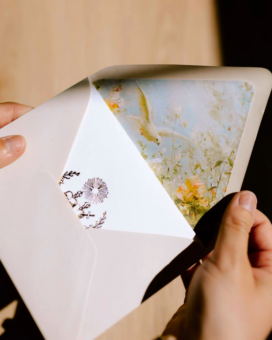 A catholic greeting card with the immaculate and sacred hearts on it in gold foil